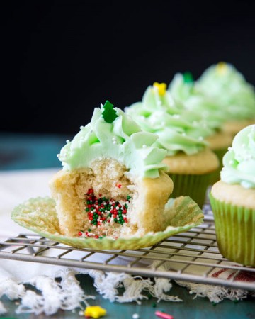 Pinata cupcakes filled with Christmas sprinkles