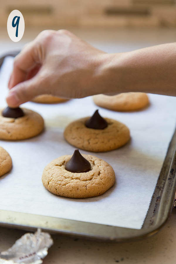 Adding chocolate to peanut butter blossom cookies