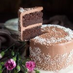 A slice of mini chocolate cake being lifted