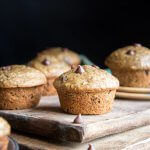 Chocolate chip zucchini bread muffins on a wooden cutting board