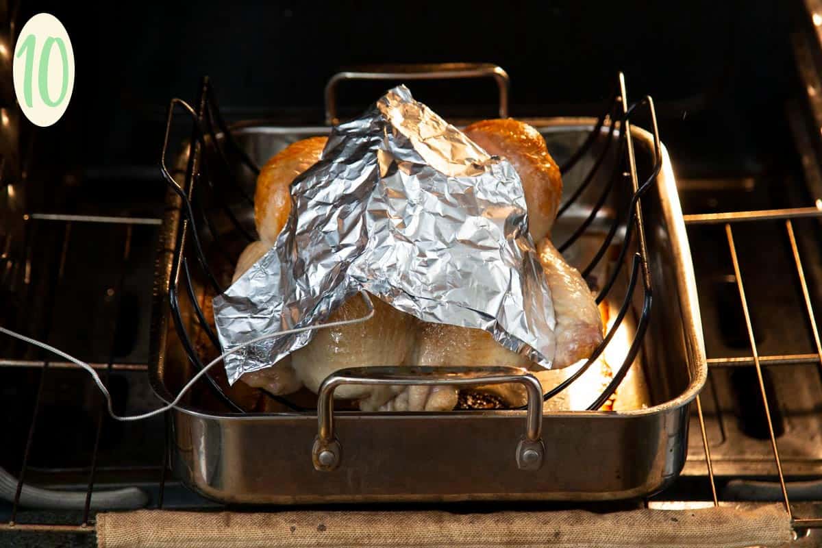 Ryan’s Thanksgiving Roast Turkey has been keeping our family full and happy for almost 10 years! This year we decided to share this recipe with you because it really is a tried and true recipe to keep for generations. #wildwildwhisk #thanksgiving #thanksgivingturkey #roastturkey #roastturkeyrecipe Turkey in a roasting pan in the oven with a piece of foil over it