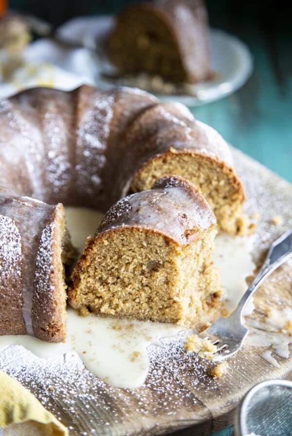 A close up shot of a half eaten slice of ginger cake