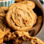 Biscoff butter cookies on a parchment lined baking tray.