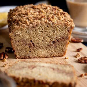 Cross section of a sour cream banana bread with pecan streusel.