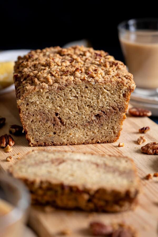 Cross section of a sour cream banana bread with pecan streusel.