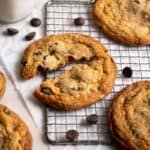 Close up of a toffee chocolate chip cookie, broken in half.