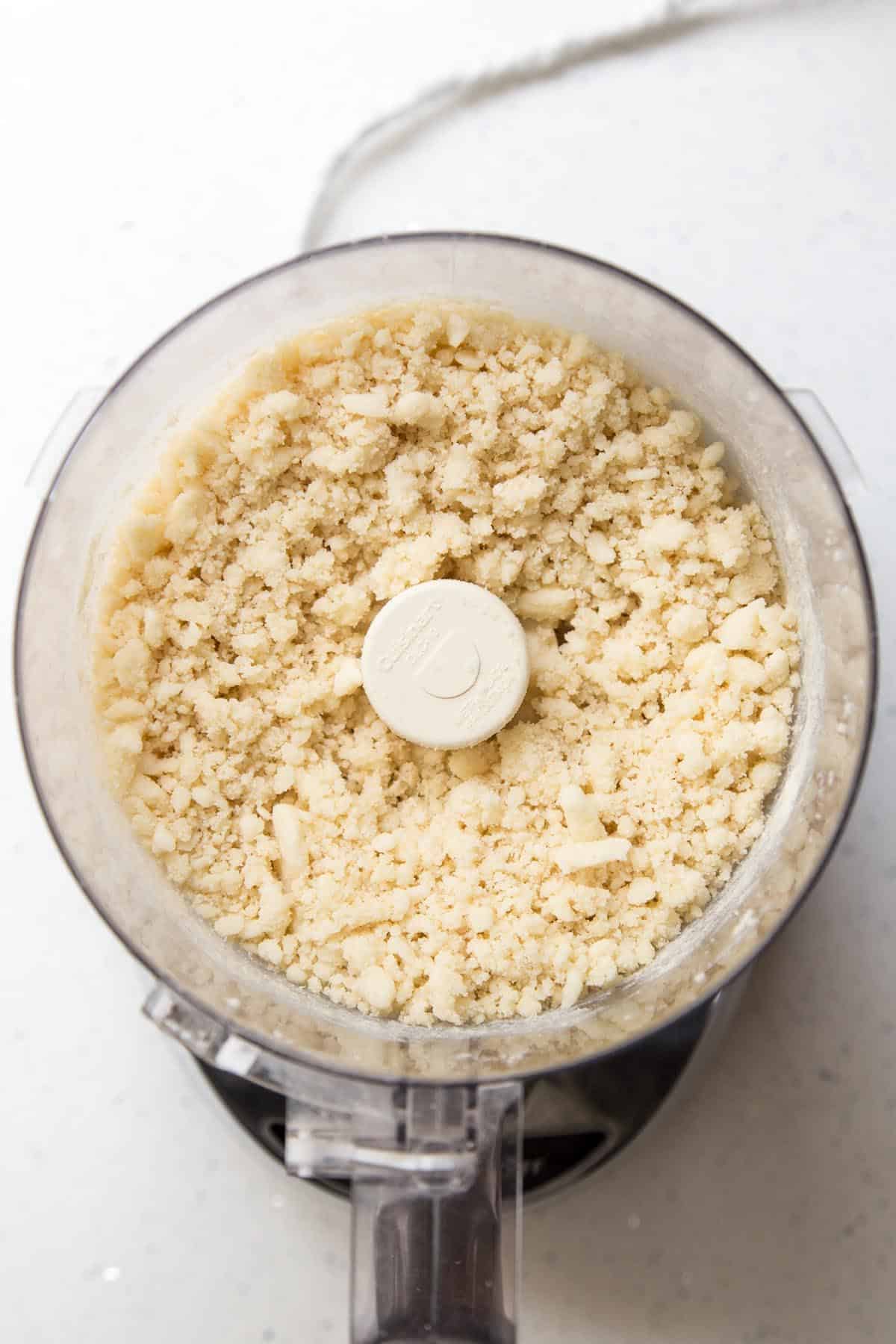 Flour mixture is blended together with butter mixture for almond frangipane.