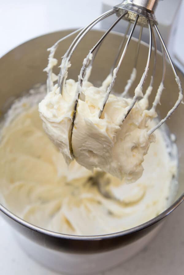 Lemon cream cheese frosting in a stand mixer.