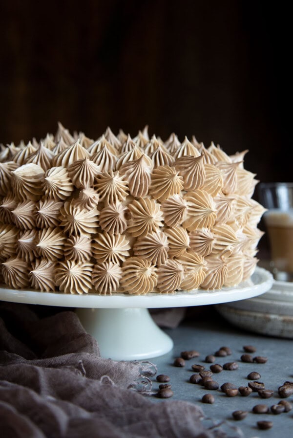 Coffee buttercream on a cake.