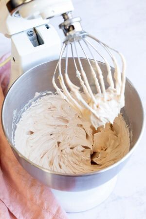 Cookie butter frosting is finished mixing in a stand mixer.