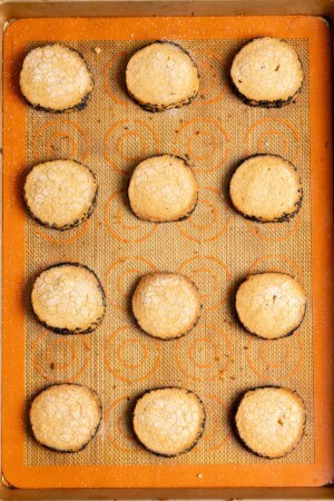 Baked miso brown sugar shortbread on a lined baking sheet.