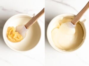 Blending miso paste with heavy cream with a small spatula.