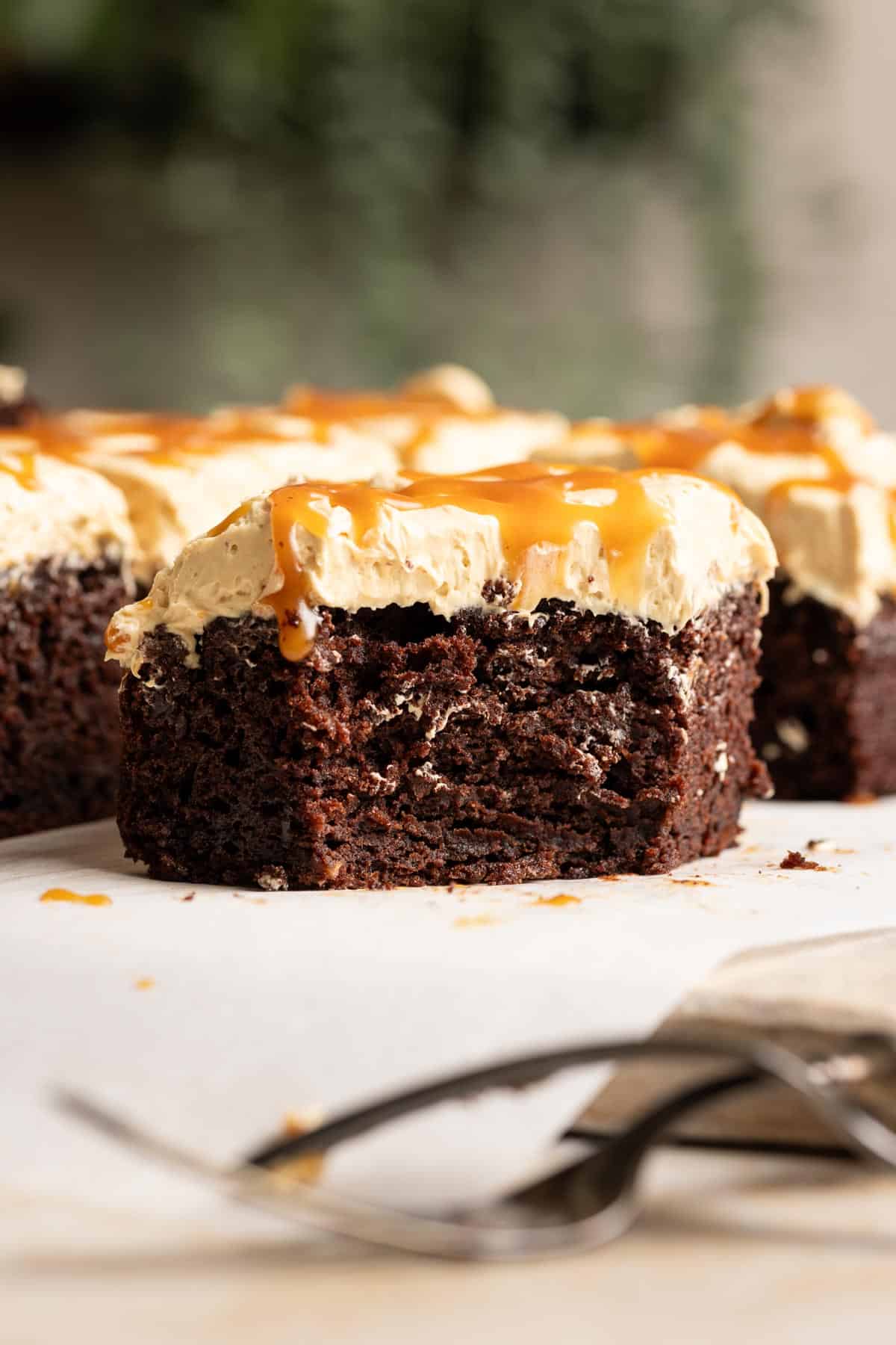 The fluffy interior of a slice of chocolate banana cake.