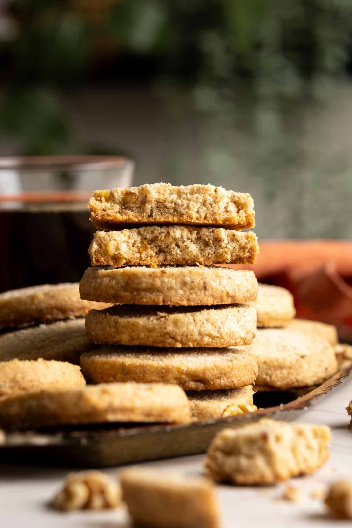 A stack of walnut coffee shortbread cookies.