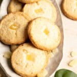 Closeup of pineapple shortbread cookies on a plate.