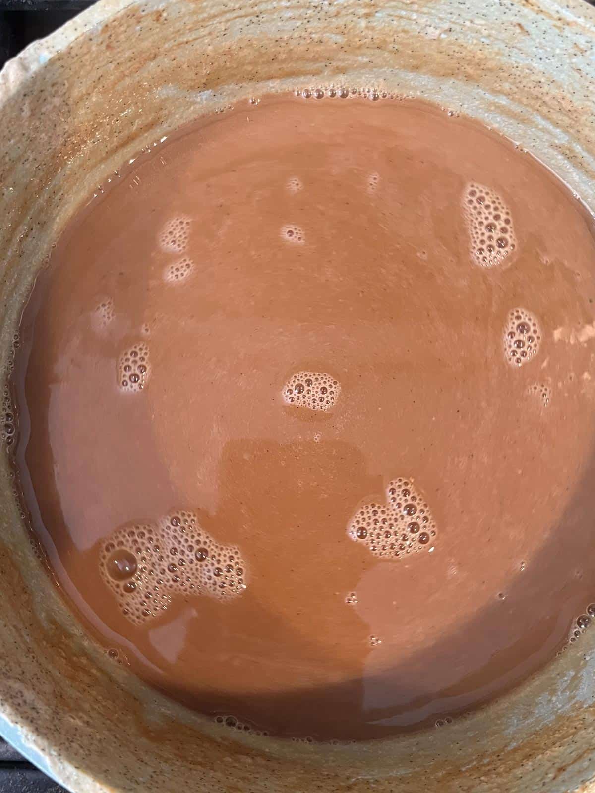 The milk mixture color deepens at 10:15 am.