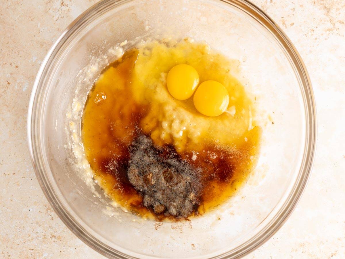 Wet ingredients in a glass mixing bowl.