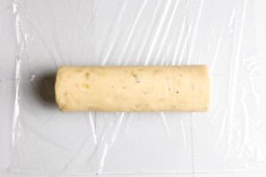 A log of rosemary shortbread cookie dough.