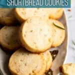 A ceramic plate with rosemary shortbread cookies.