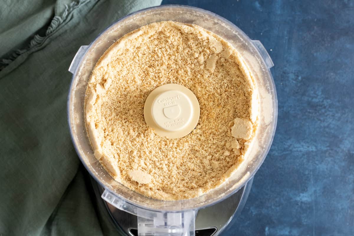 Vanilla wafer cookie crumbs in a food processor.